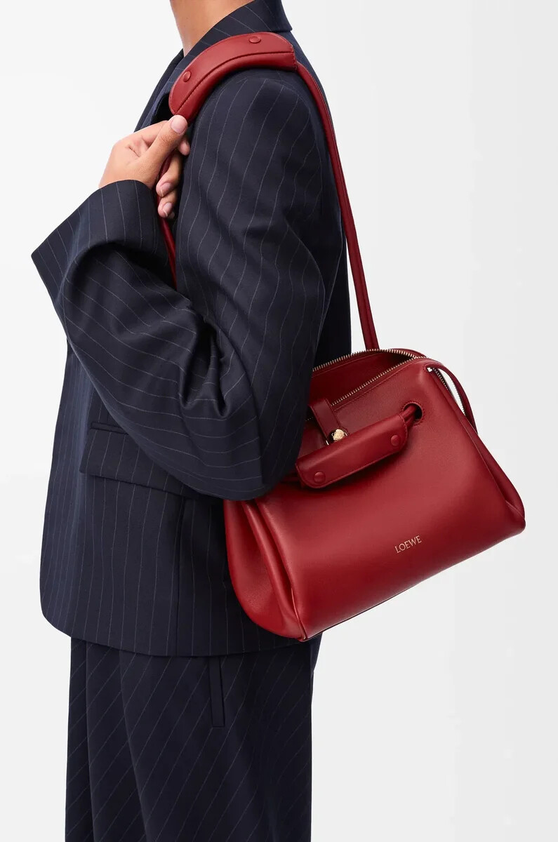 piccola borsa madrid in morbida pelle di vitello rosso bruciato