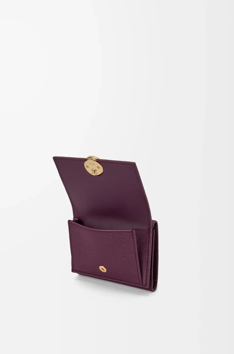 portafoglio trifold pebble in pelle di vitello martellata color prugna