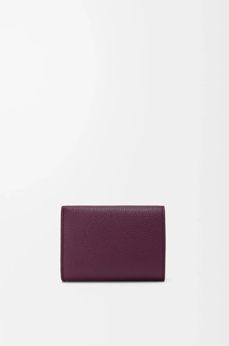 portafoglio trifold pebble in pelle di vitello martellata color prugna