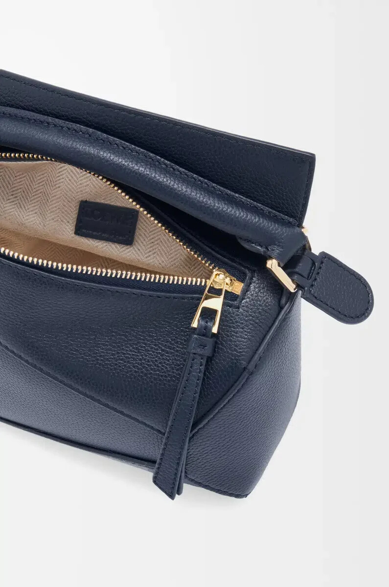 borsa mini puzzle edge in morbida pelle di vitello grana deep navy