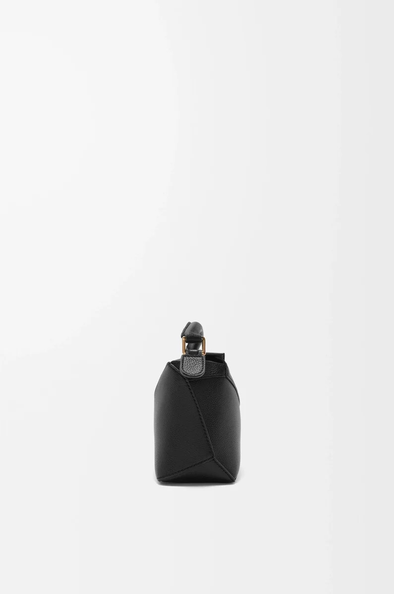 borsa mini puzzle edge in morbida pelle di vitello granata nero