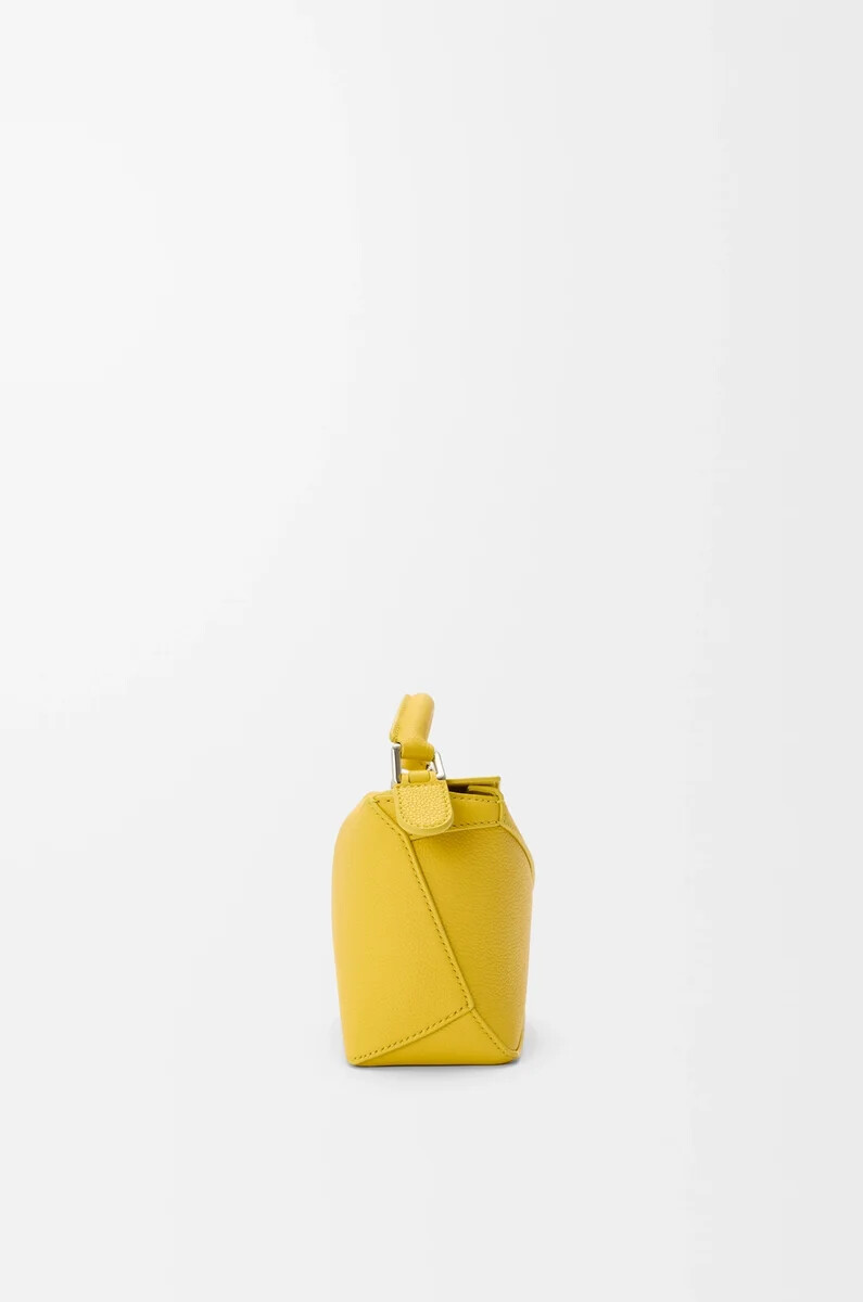 borsa mini puzzle edge in morbida pelle di vitello grana dandelion