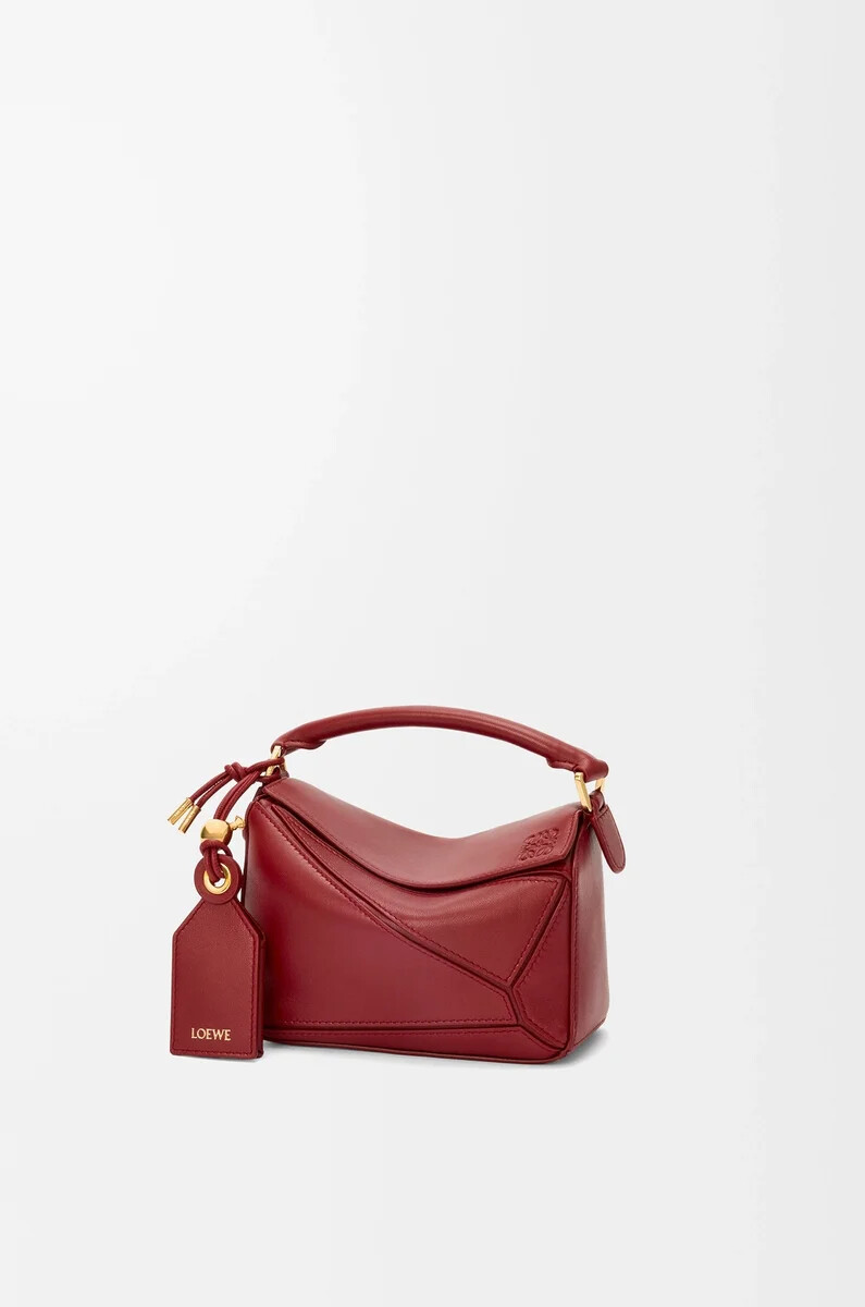 borsa mini featherlight puzzle in nappa di agnello burnt red
