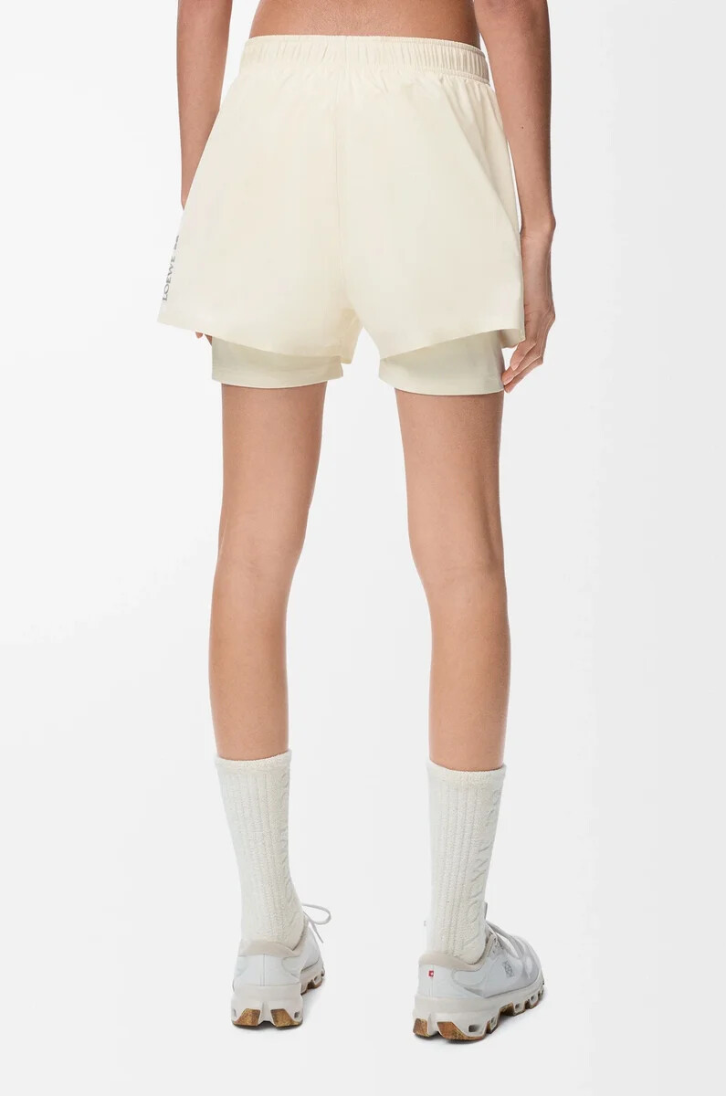 pantaloncini sportivi in shell tecnico avorio