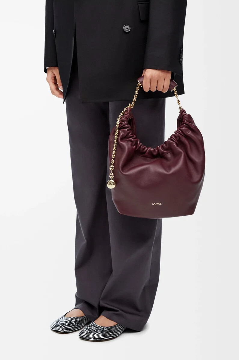 piccola borsa squeeze in morbida nappa di agnello color borgogna scuro