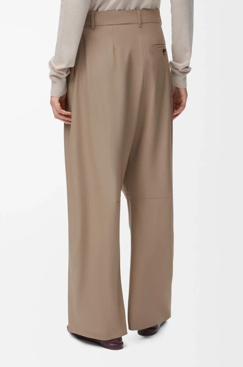 pantaloni a botte in lana sabbia