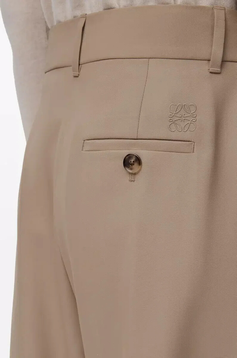 pantaloni a botte in lana sabbia