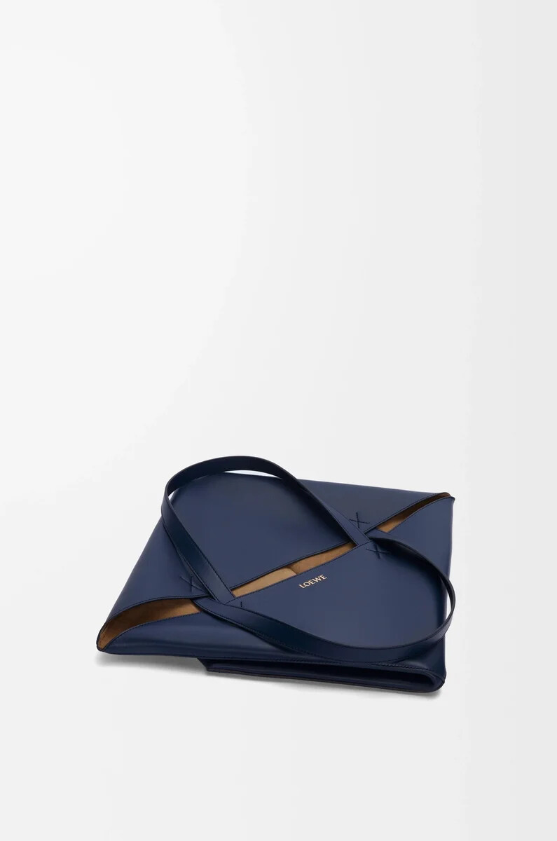 borsa xl puzzle fold in pelle di vitello lucida abyss blue