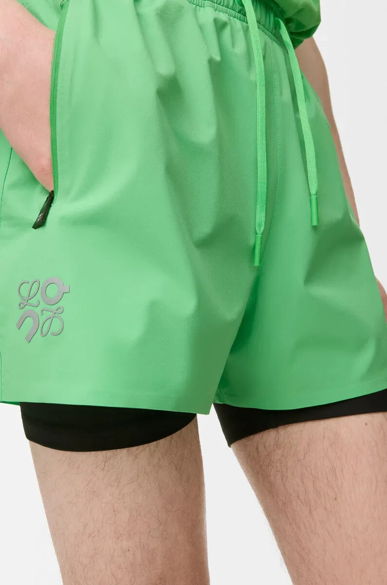 pantaloncini sportivi in shell tecnico verde
